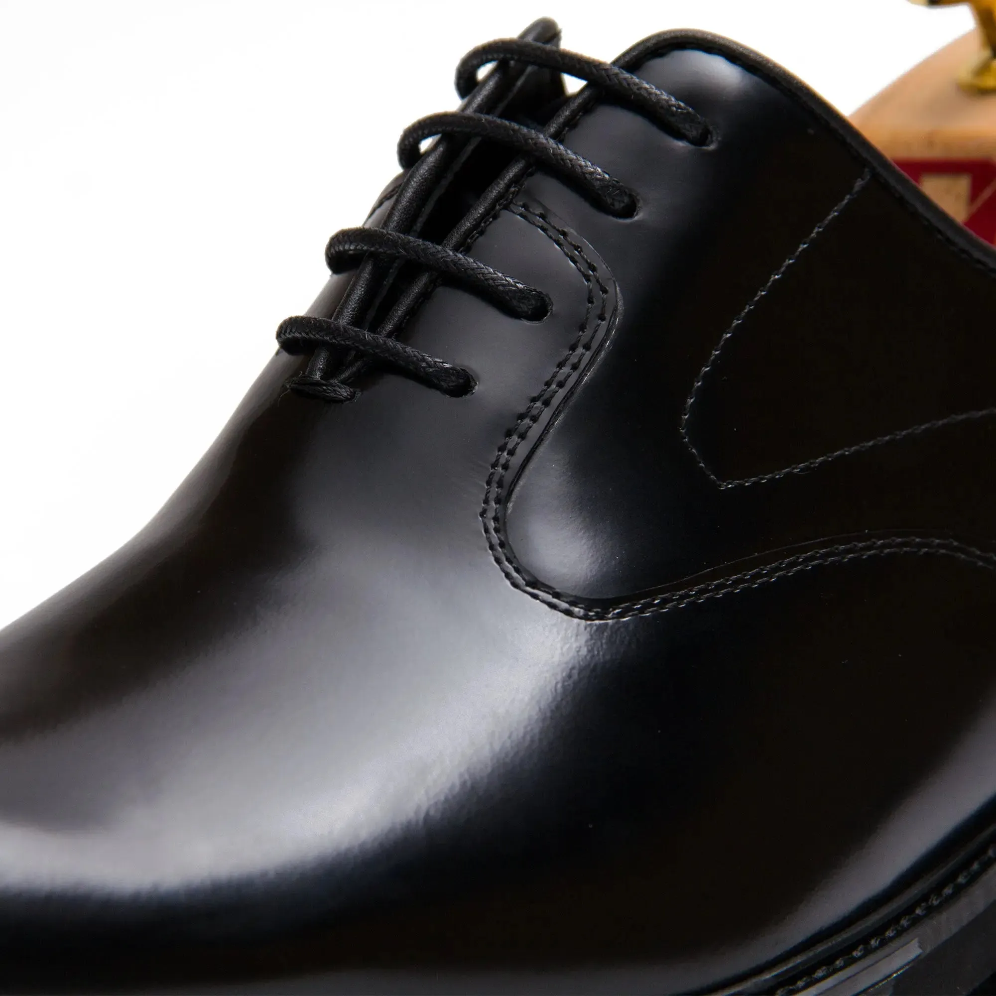 Black leather oxford shoes with rubber sole