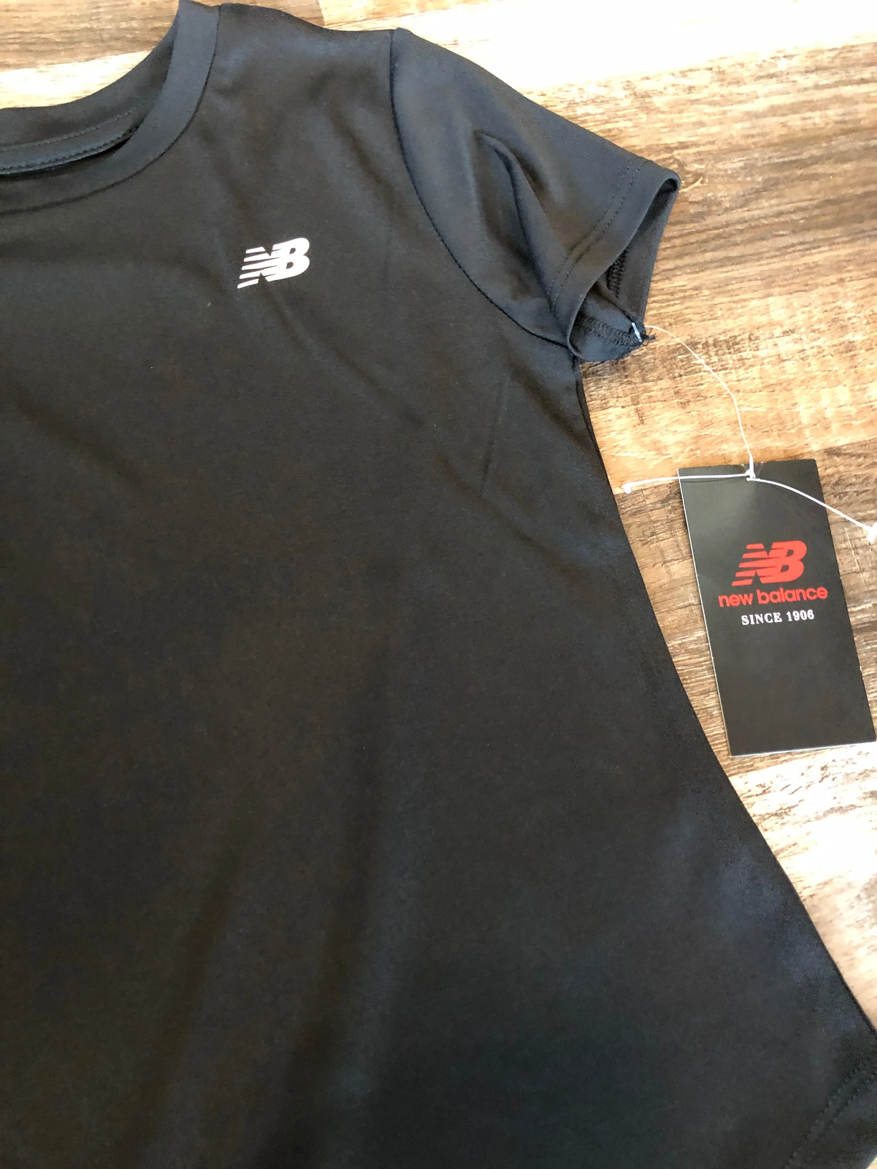 NEW BALANCE New! Black Short Sleeve Shirt girls size small 7/8